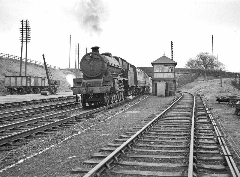 Loco 45642.jpg - Number  45642   "Boscawen"    - Jubilee 4-6-0 - Designed by William Stanier.   Photographed 5th May 1956  with Leeds to Morecambe passenger train.   Built May 1934 at  Crewe Works  for the LMS Railway. Built as 5552, renumbered to 5642 in Apr 1935 with no name.  A total of 191 Jubilees were built between 1934 and 1936; they were designed for main line passenger service. Its last shed was Newton Heath. Withdrawn from service in Jan 1965 & disposed of in April 1965.